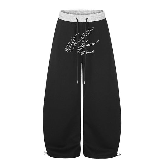 Damen Weite Culotte-Sweatpants mit hohem Bund, Tunnelzug und elegante Script-Print Nord Taschen
