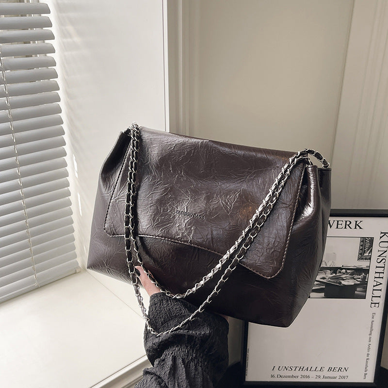 Damen modische Umhängetasche mit eleganter Kettenverzierung Nord Taschen