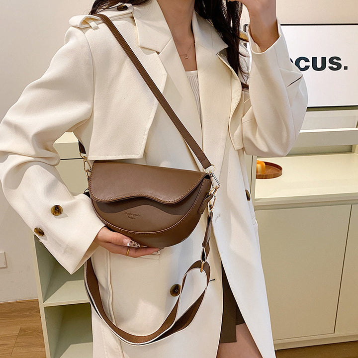 Damen Umhängetasche mit elegantem Kurvenmuster und praktischen Fächern Nord Taschen