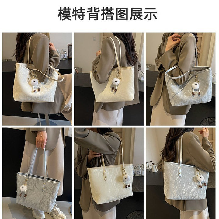 Damen-Handtasche mit hochwertiger Textur und verspieltem Charme Nord Taschen
