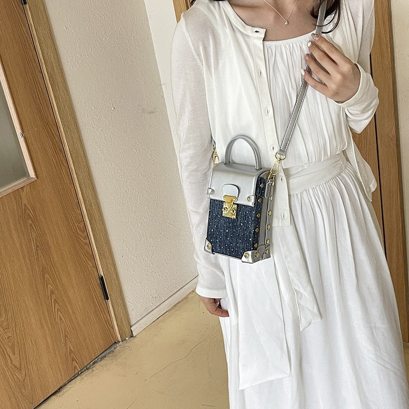 Damen Mini Bag mit Metallic-Oberfläche und Jeans-Akzenten Nord Taschen