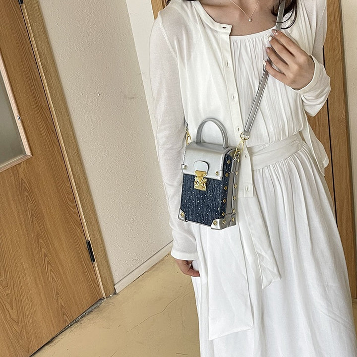 Damen Mini Bag mit Metallic-Oberfläche und Jeans-Akzenten Nord Taschen