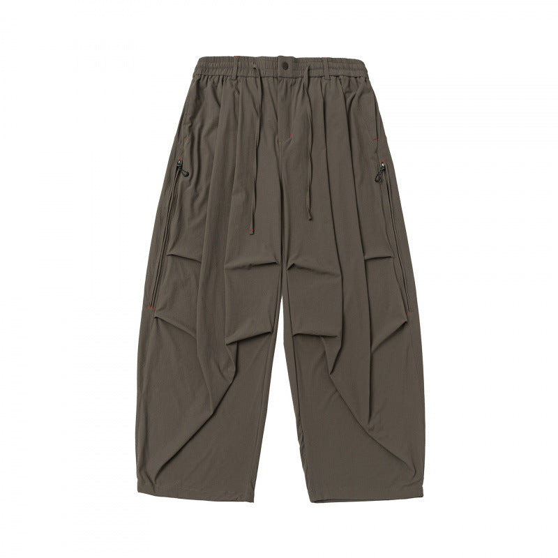 Unisex Weitgeschnittene technische Cargo-Hose mit Gummibund, Kordelzug und Reißverschlusstaschen Nord Taschen