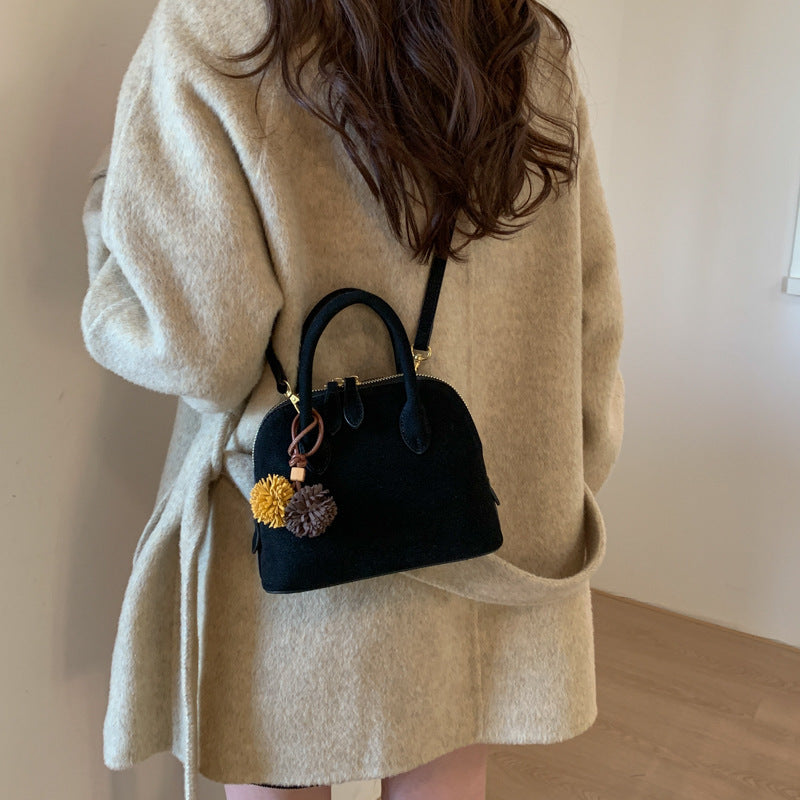 Damen Handtasche mit eleganten Quasten Nord Taschen