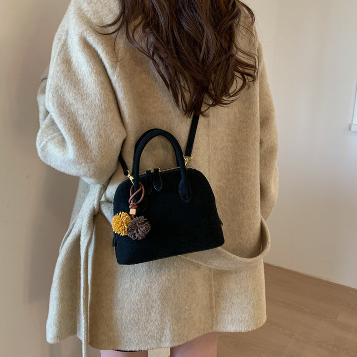 Damen Handtasche mit eleganten Quasten Nord Taschen