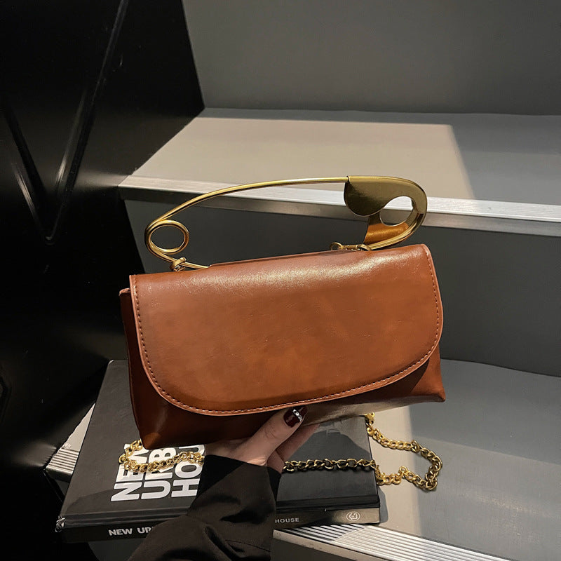 Damen elegante Handtasche mit künstlerischem Metallgriff Nord Taschen