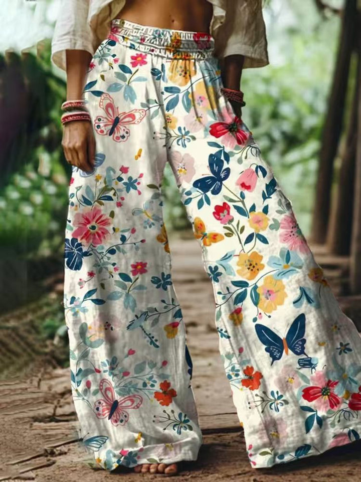 Damen Weite Sommerhose mit buntem Blumen- und Schmetterlingsprint