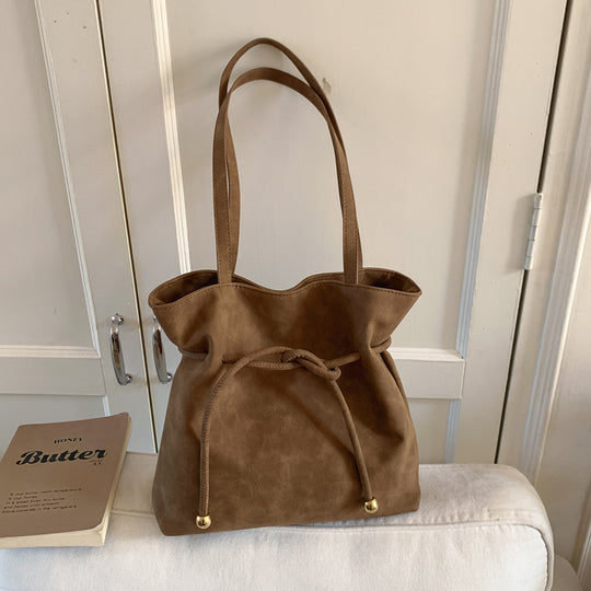 Damen Hobo-Tasche aus weichem Kunstleder mit praktischem Kordelzug Nord Taschen