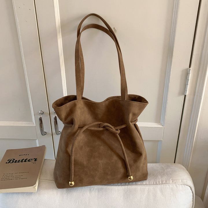 Damen Hobo-Tasche aus weichem Kunstleder mit praktischem Kordelzug Nord Taschen