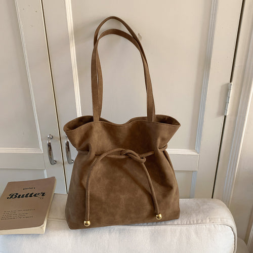 Damen Hobo-Tasche aus weichem Kunstleder mit praktischem Kordelzug Nord Taschen