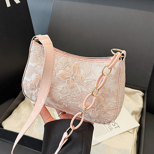 Damen Handtasche mit handgearbeitetem Blumenmuster und modischem Kettenriemen Nord Taschen
