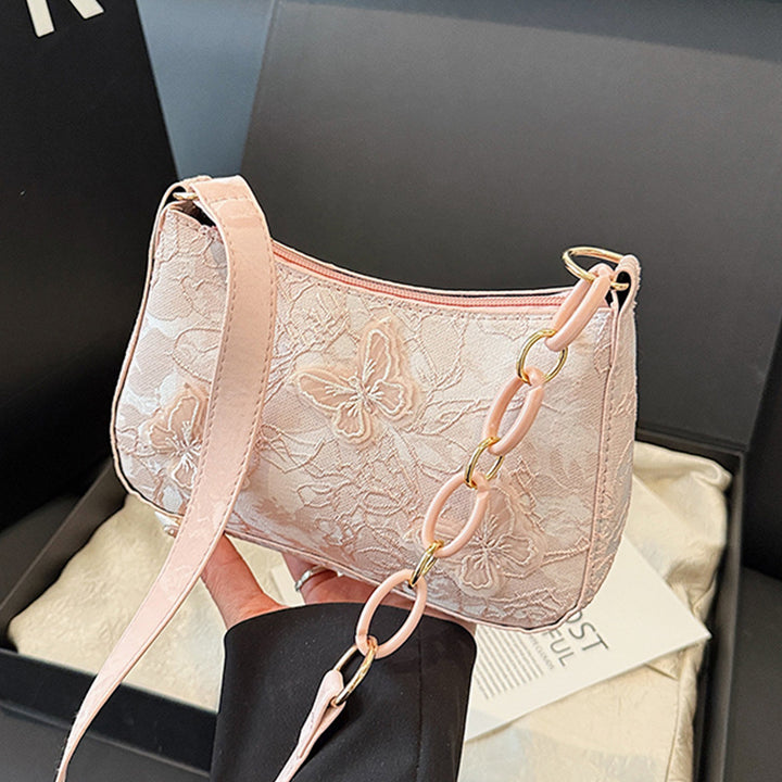 Damen Handtasche mit handgearbeitetem Blumenmuster und modischem Kettenriemen Nord Taschen