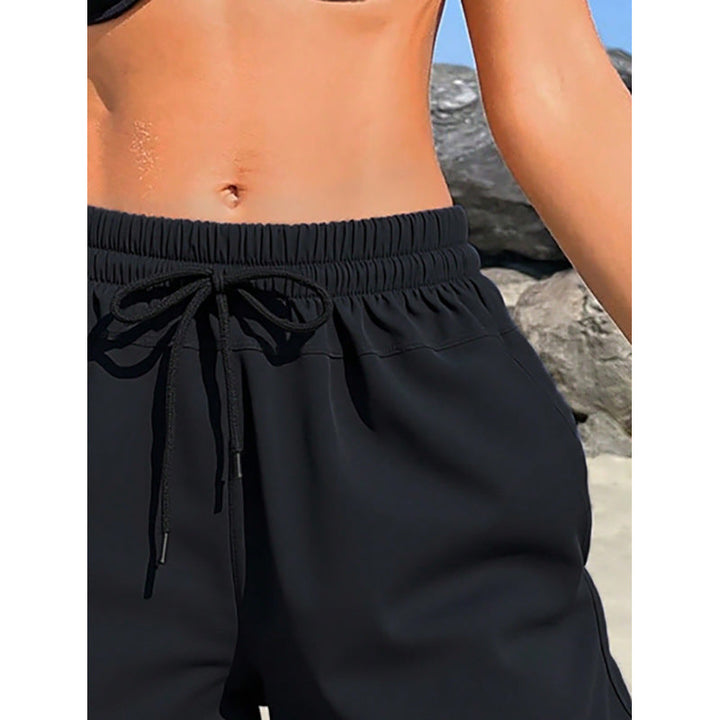 Damen Sportliche Badeshorts mit elastischem Bund und praktischen Taschen