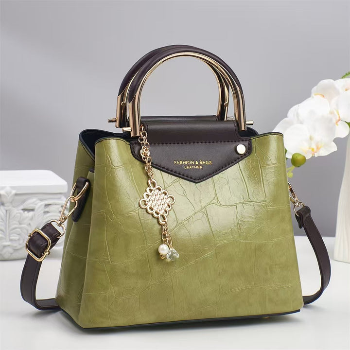 Damen elegante Handtasche mit goldenen Akzenten Nord Taschen