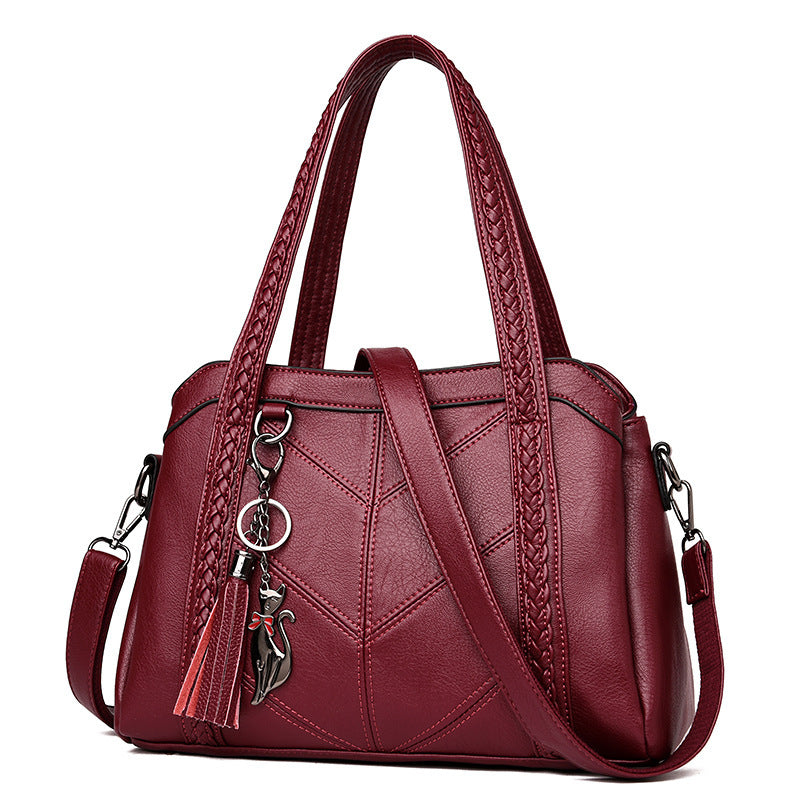 Damen modische Handtasche mit geflochtenen Akzenten Nord Taschen
