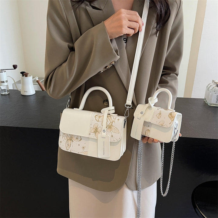 Damen elegante Umhängetasche mit floralem Design und modischen Akzenten Nord Taschen