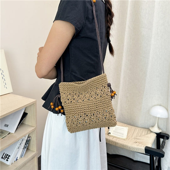 Damenhandtasche aus handgewebtem Naturmaterial mit verspielten Details Nord Taschen