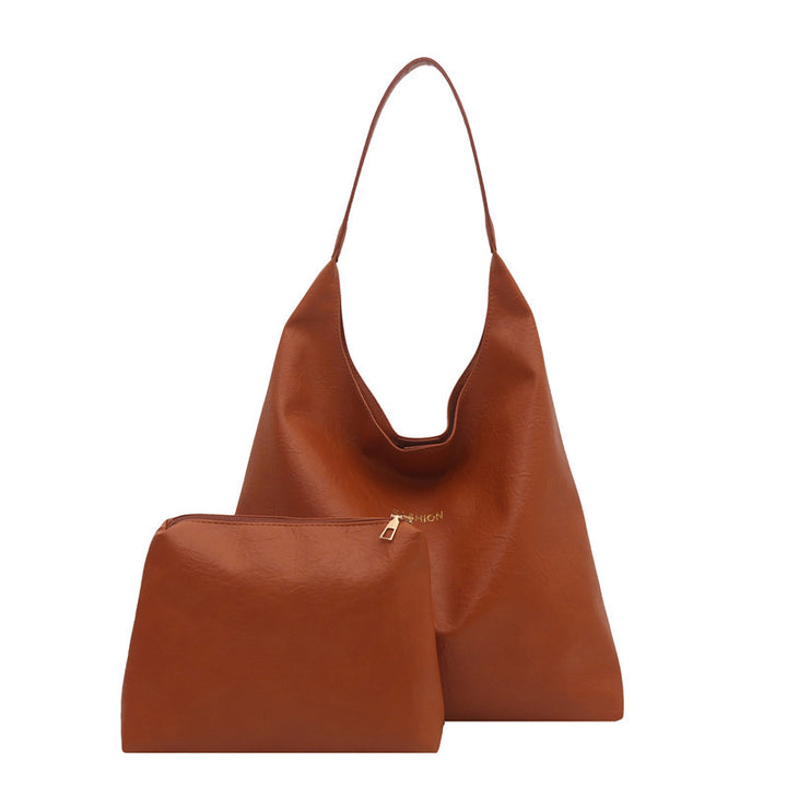 Damen elegante Umhängetasche aus kunstleder mit einer passenden Kosmetiktasche Nord Taschen