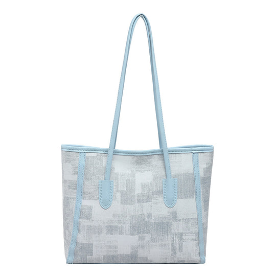 Damen Tragetasche mit strukturiertem Kunstleder und raffinierten Details Nord Taschen