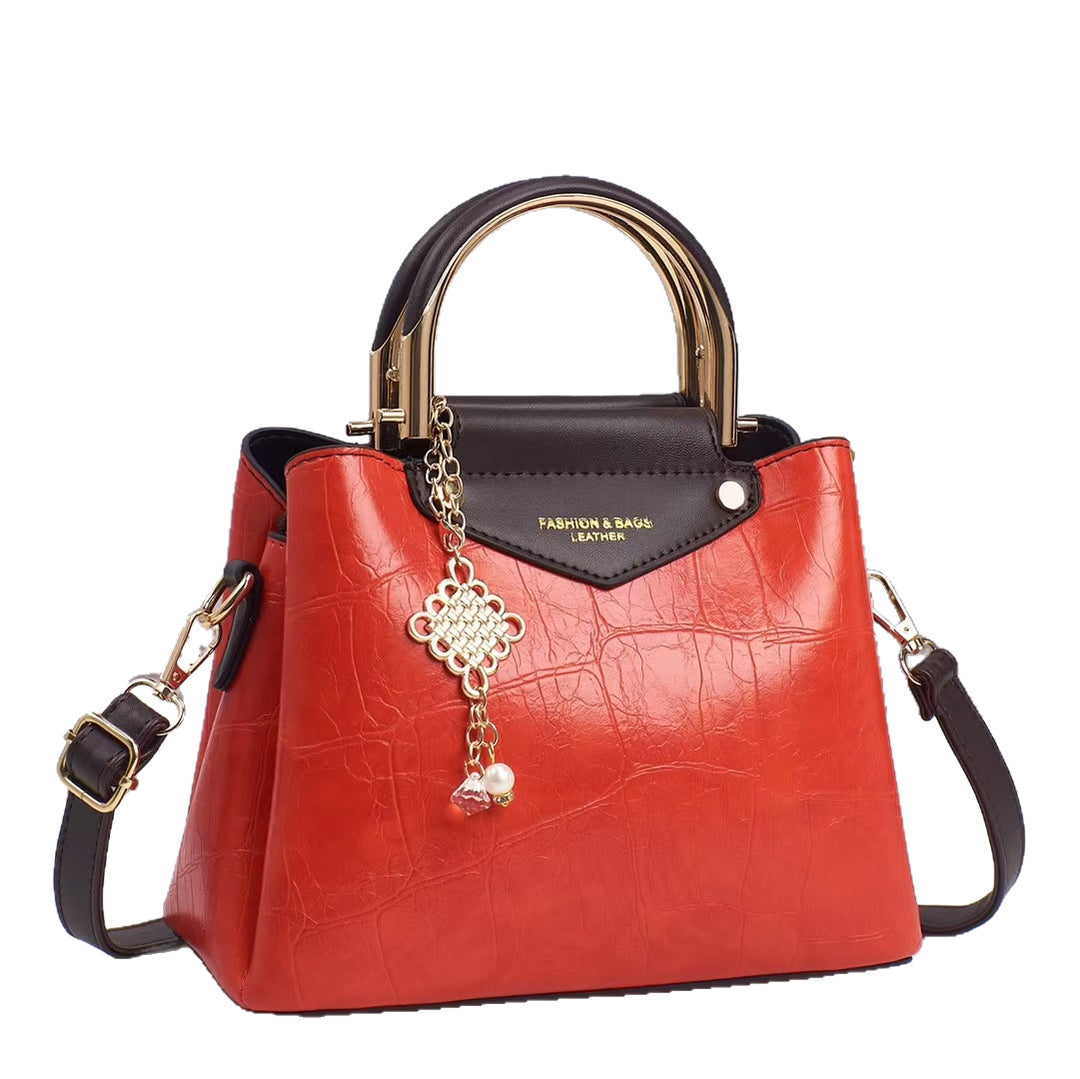 Damen elegante Handtasche mit goldenen Akzenten Nord Taschen