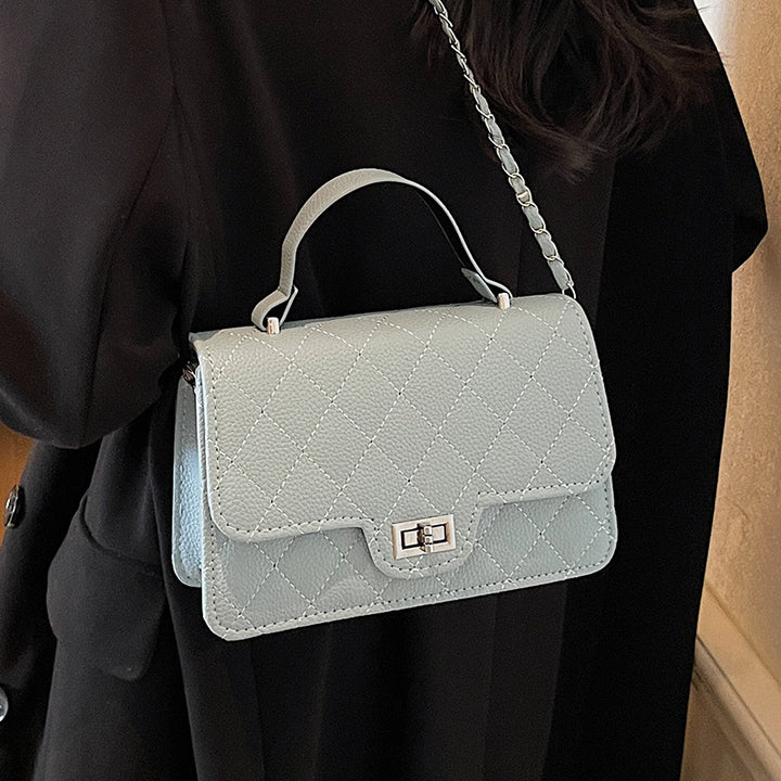 Damen Handtasche mit eleganter Steppung und schickem Metallverschluss Nord Taschen