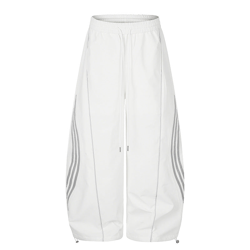 Damen Weite Tech-Material Palazzohose mit Tunnelzugbund, reflektierenden Seitenstreifen und verstellbarem Kordel-Saum Nord Taschen