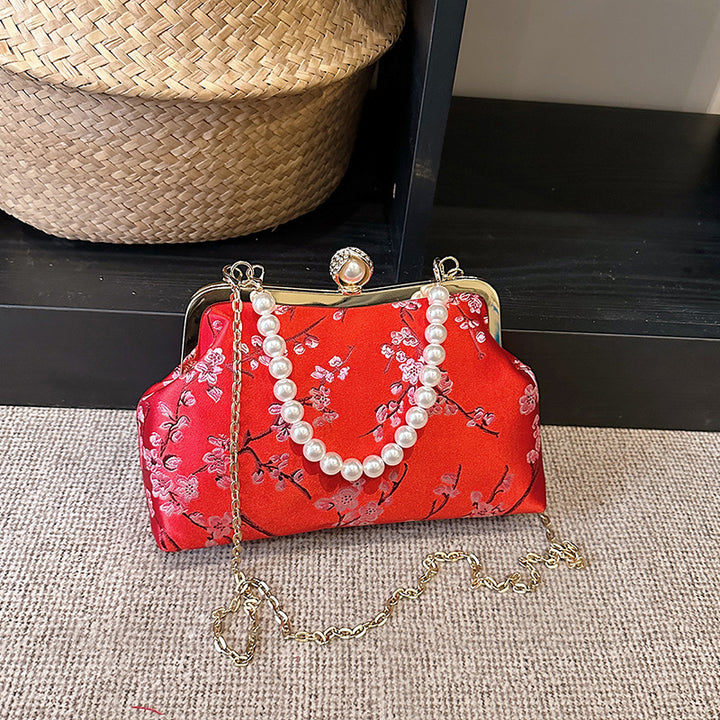 Damen elegante Clutch mit floralen Akzenten Nord Taschen