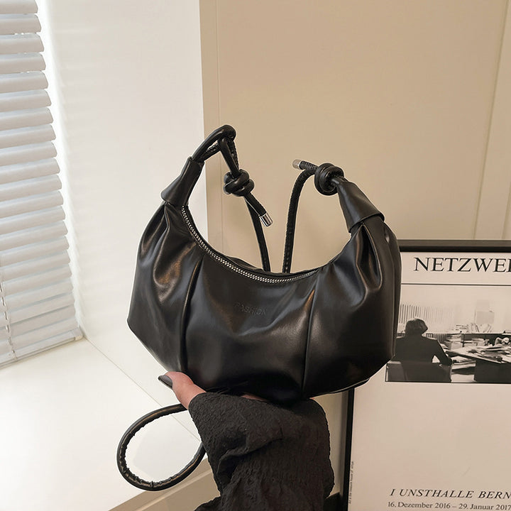 Damen Handtasche mit einzigartigem Kordelzugdesign und verspieltem Anhänger Nord Taschen