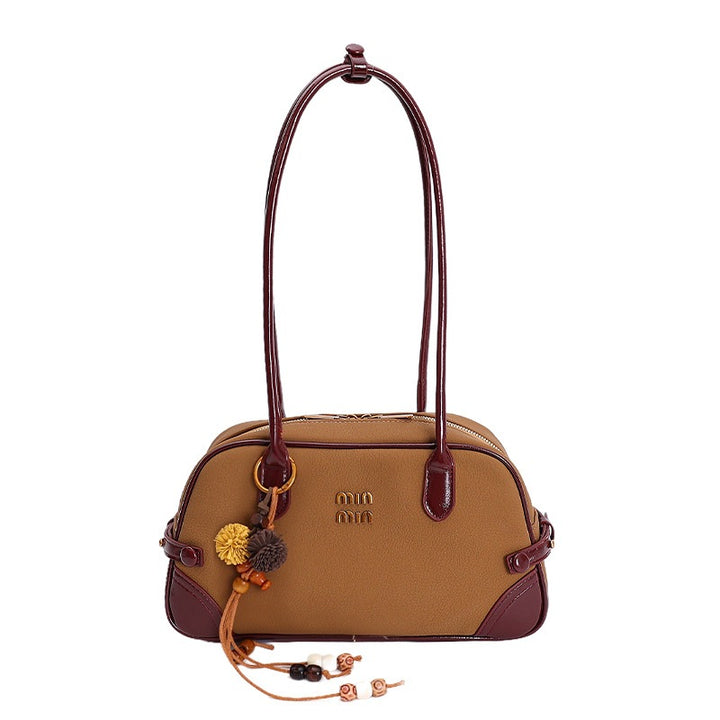 Damen elegante Handtasche mit verspielten Anhängern Nord Taschen