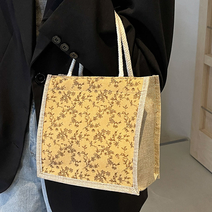 Damen Handtasche mit floralem Design und robusten Griffen Nord Taschen