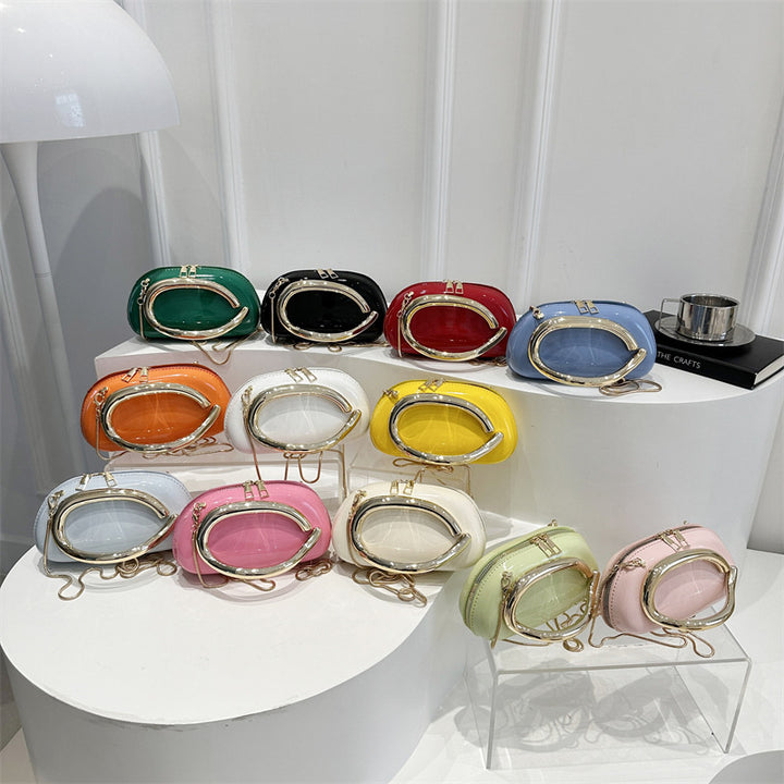 Damen Handtasche mit innovativem Kettenverschluss und funkelndem Design Nord Taschen