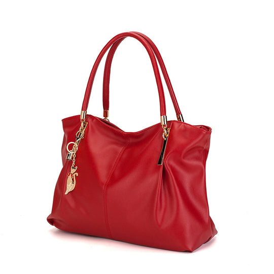 Damen Hobo-Tasche mit geschwungener Silhouette und goldenen Akzenten Nord Taschen