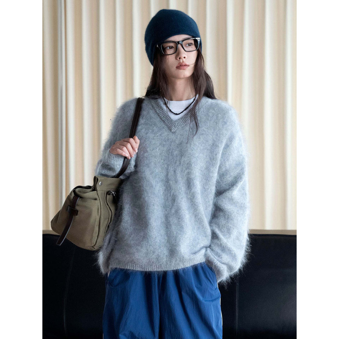 Damen Weicher Fluffy V‑Ausschnitt Pullover mit lockerer Silhouette Nord Taschen