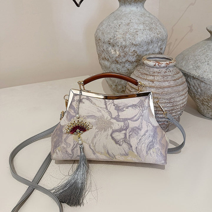 Damen Handtasche mit floralem Design und eleganten Details Nord Taschen