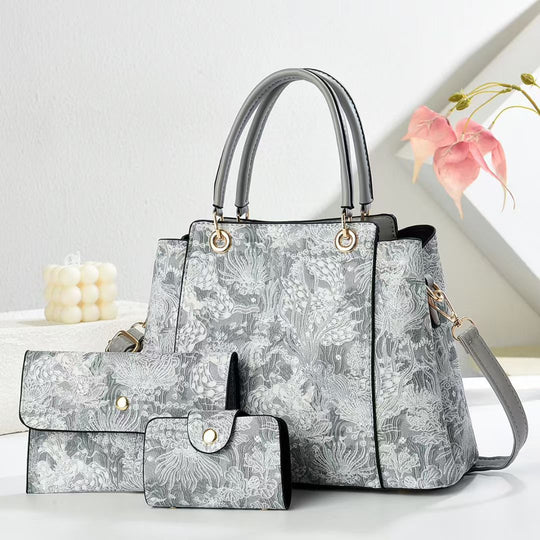 Damen elegante Handtasche mit floralem Muster und passendem Zubehör Nord Taschen