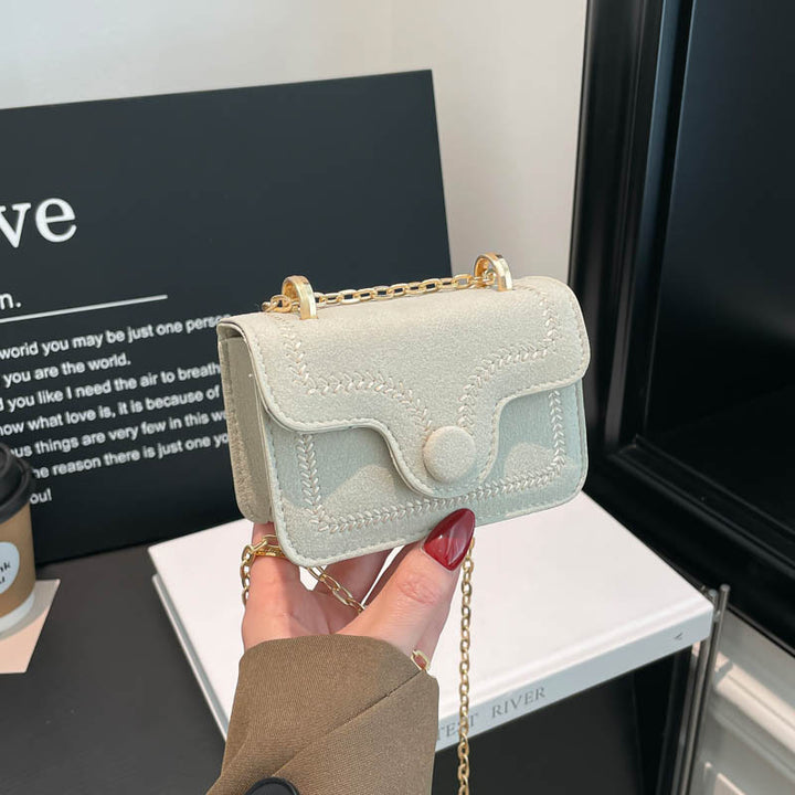 Damen Mini-Henkeltasche mit elegantem Steppmuster und goldenen Akzenten Nord Taschen