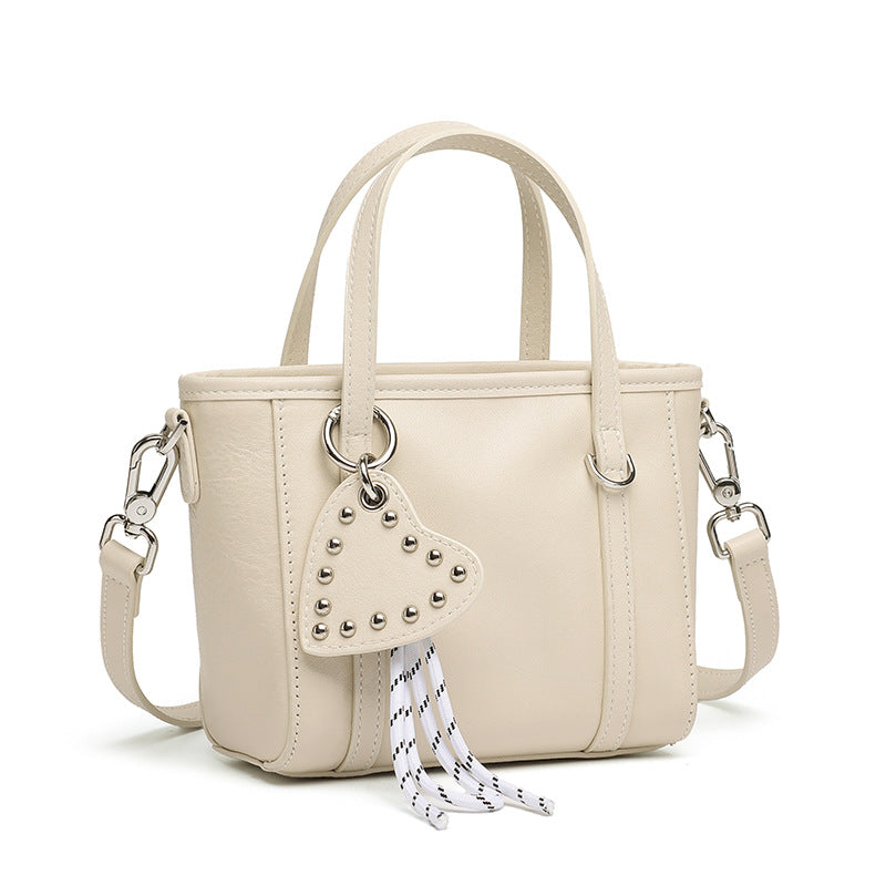 Damen modische Handtasche mit Herzanhänger und abnehmbarem Schulterriemen Nord Taschen