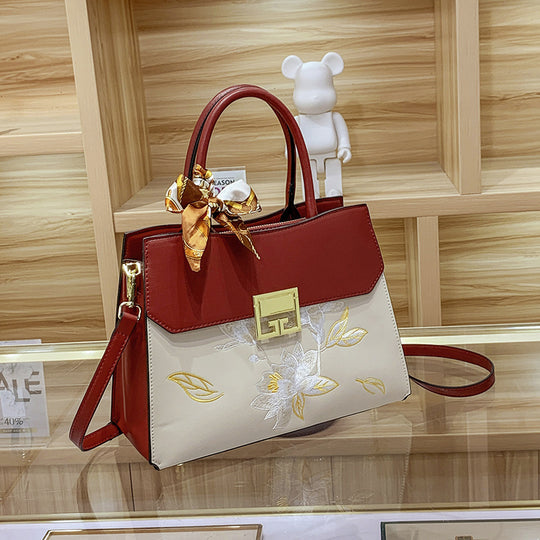 Damen Handtasche mit elegantem floralem Design und praktischen Trageoptionen Nord Taschen