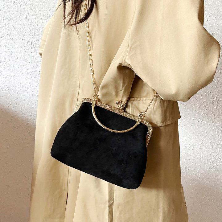Damen elegante Clutch-Tasche mit Kettenriemen und floralem Verschluss Nord Taschen