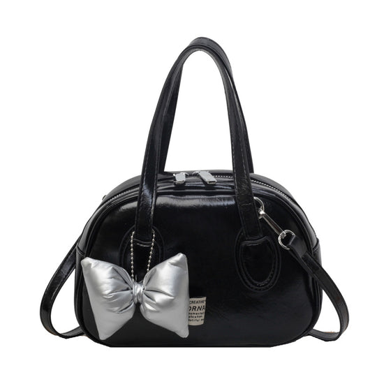 Damen Designer-Handtasche im verspielten Stil mit dekorativem Schleifen-Detail | Nord Taschen