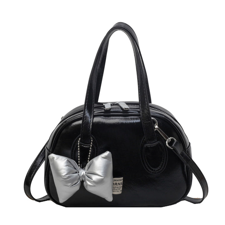 Damen Designer-Handtasche im verspielten Stil mit dekorativem Schleifen-Detail | Nord Taschen