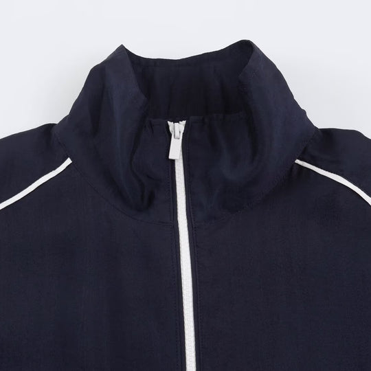 Damen Cropped Windbreaker-Jacke mit hohem Funnelkragen, Kontrastpaspel und elastischem Saum Nord Taschen
