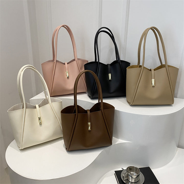 Damen elegante Tragetasche mit goldenen Akzenten Nord Taschen