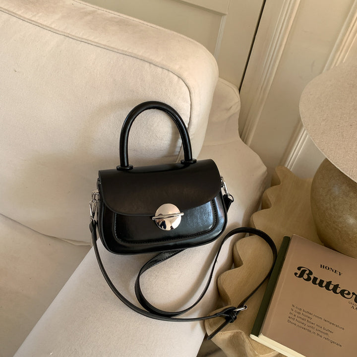 Damen elegante Handtasche mit dezentem Verschluss Nord Taschen