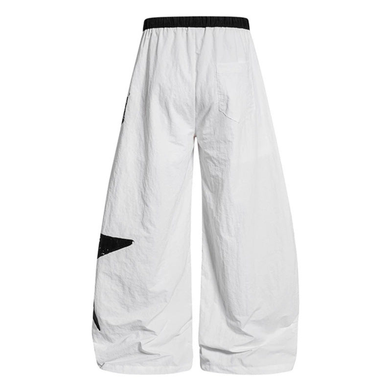 Damen Weite Palazzo-Hose mit Tunnelzugbund und großflächigem Statement-Print Nord Taschen