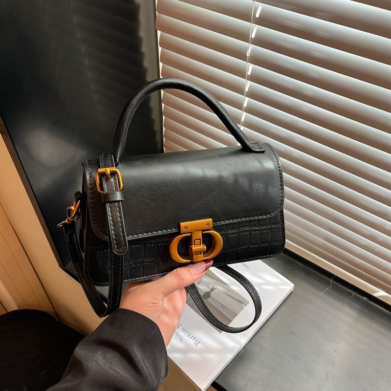 Damen elegante Handtasche mit strukturierter Oberfläche und glänzendem Verschluss Nord Taschen