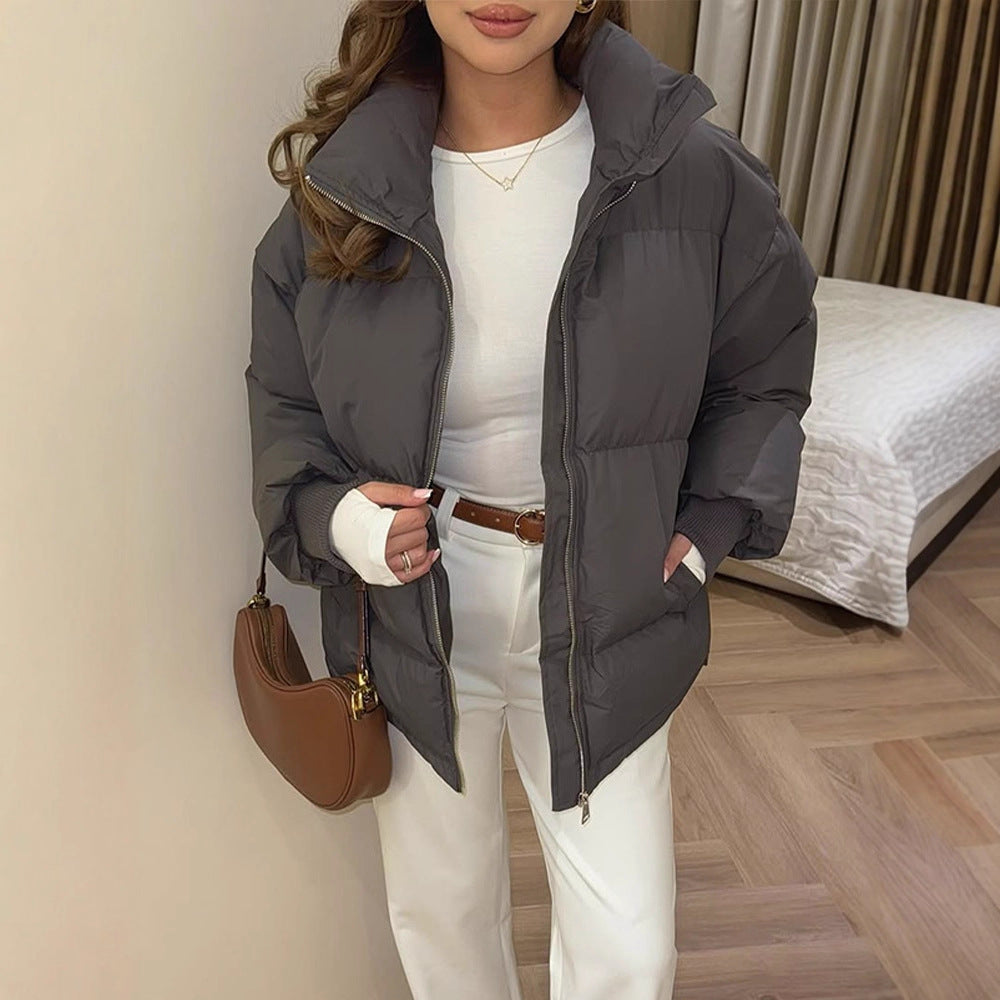 Damen Kurze taillierte Pufferjacke mit Rippbündchen und hohem Stehkragen Nord Taschen