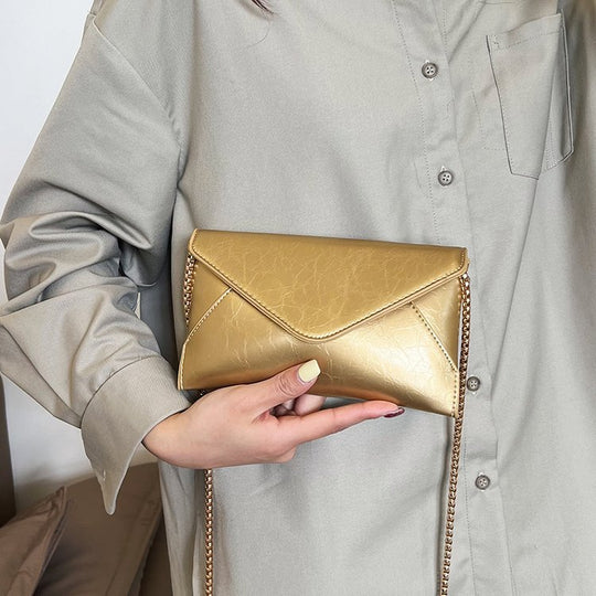 Damen Umhängetasche aus hochwertigem Kunstleder mit elegantem Kettenriemen Nord Taschen