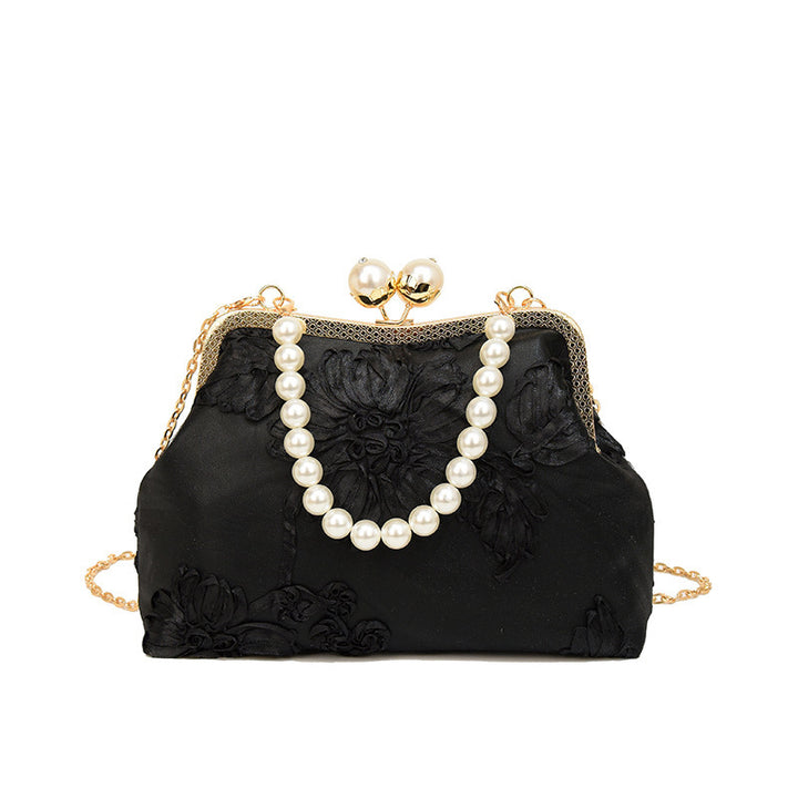 Damen elegante Clutch mit floralen Stickereien und Perlenakzenten Nord Taschen