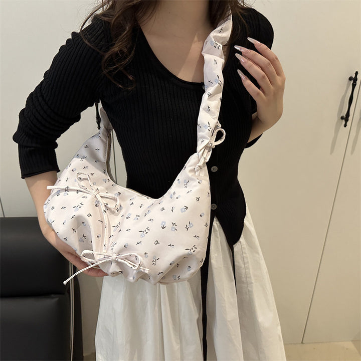 Damen modische Umhängetasche mit Blumenmuster und verspieltem Tragegriff Nord Taschen